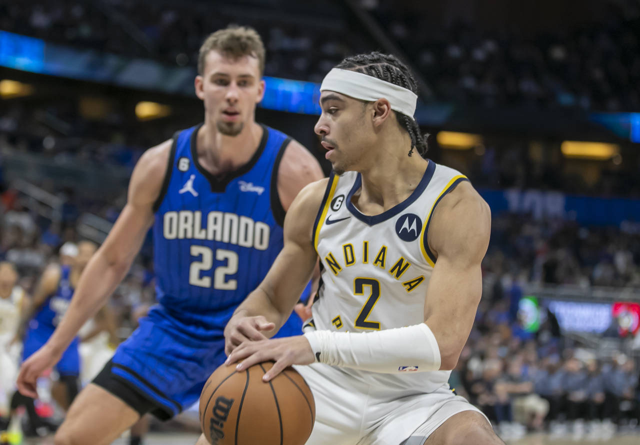 Indiana Pacers guard Andrew Nembhard (2) drives against Orlando Magic forward Franz Wagner (22) dur...