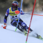 
              Greece's AJ Ginnis speeds down the course during the men's World Championship slalom, in Courchevel, France, Sunday Feb. 19, 2023. (AP Photo/Alessandro Trovati)
            