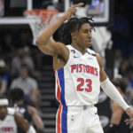 
              Detroit Pistons guard Jaden Ivey (23) reacts after scoring a 3-pointer during the first half of an NBA basketball game against the Orlando Magic, Thursday, Feb. 23, 2023, in Orlando, Fla. (AP Photo/Phelan M. Ebenhack)
            
