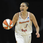 
              FILE - Phoenix Mercury guard Diana Taurasi (3) calls a play as she brings the ball up court against the Las Vegas Aces during the second half of Game 2 in the semifinals of the WNBA playoffs on Sept. 30, 2021, in Las Vegas. Taurasi has re-signed with the Mercury, agreeing to a multiyear contract Saturday, Feb. 18, 2023, the team announced.  (AP Photo/David Becker, File)
            