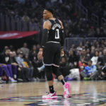 
              Los Angeles Clippers guard Russell Westbrook walks down court during the first half of an NBA basketball game against the Sacramento Kings Friday, Feb. 24, 2023, in Los Angeles. (AP Photo/Mark J. Terrill)
            