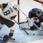
              Colorado Avalanche goaltender Alexandar Georgiev, right, makes a stic-save against a shot by Vegas Golden Knights right wing Phil Kessel (8) in the first period of an NHL hockey game Monday, Feb. 27, 2023, in Denver. (AP Photo/David Zalubowski)
            