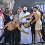
              Jake Paul, left, and Tommy Fury, face off after a weigh-in, a day before their match, in Riyadh, Saudi Arabia, Saturday, Feb. 25, 2023. (AP Photo)
            