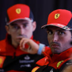 
              FILE - Ferrari driver Carlos Sainz, of Spain, right, accompanied by teammate Charles Leclerc, of Monaco, attends a press conference in Sao Paulo, Brazil, on Nov. 9, 2022. Several hundred fans, a coin toss and an iconic red car already on the track — it wasn’t the usual Formula One car presentation for Ferrari on Tuesday, Feb. 14, 2023. In front of a grandstand packed with about 500 passionate red-clad fans, drivers Charles Leclerc and Carlos Sainz Jr. did laps of Ferrari’s Fiorano track in the new SF-23 car. (AP Photo/Marcelo Chello)
            