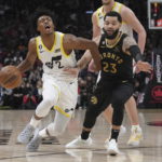 
              Utah Jazz's Collin Sexton drives against Toronto Raptors' Fred VanVleet during the first half of an NBA basketball game Friday, Feb. 10, 2023, in Toronto. (Chris Young/The Canadian Press via AP)
            