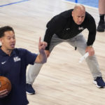 
              FILE - Jim Boylen, right, supervises the on-court drills during the NBA basketball draft combine May 18, 2022, in Chicago. Boylen led the coaching staff Thursday, Feb. 23, 2023, as the United States defeated Uruguay in a FIBA Americas game. The U.S. clinched a berth in the 32-team FIBA World Cup. (AP Photo/Charles Rex Arbogast, File)
            