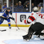 
              St. Louis Blues' Robert Thomas (18) looks for a shot on New Jersey Devils goaltender Mackenzie Blackwood during the second period of an NHL hockey game Thursday, Feb. 16, 2023, in St. Louis. (AP Photo/Scott Kane)
            