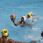 
              Youth team players warm-up ahead of the Black star water polo competition held at the University of Ghana in Accra, Saturday, Jan. 14, 2023. Former water polo pro Asante Prince is training young players in the sport in his father's homeland of Ghana, where swimming pools are rare and the ocean is seen as dangerous. (AP Photo/Misper Apawu)
            