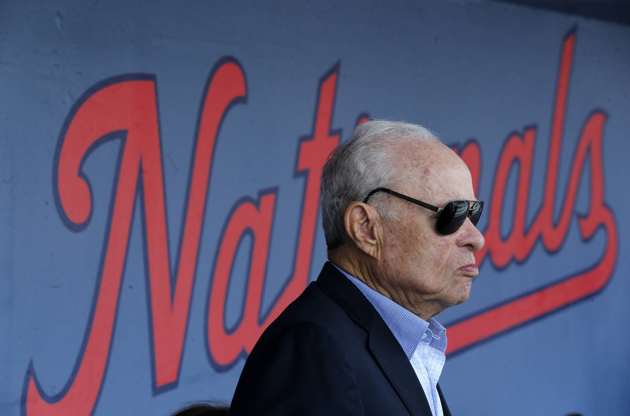 FILE - Washington Nationals owner Ted Lerner is shown in the dugout before a spring training baseba...