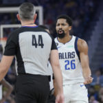 
              Dallas Mavericks guard Spencer Dinwiddie (26) reacts toward referee Brett Nansel (44) after being called for a technical foul during the first half of an NBA basketball game between the Golden State Warriors and the Mavericks in San Francisco, Saturday, Feb. 4, 2023. (AP Photo/Jeff Chiu)
            