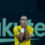 
              Colombia's Juan Cabal reacts after losing a point during a Davis Cup qualification doubles match against Neal Skupski and Dan Evans, of Britain, in Cota, Colombia, Saturday, Feb. 4, 2023. (AP Photo/Fernando Vergara)
            