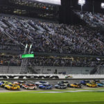
              Alex Bowman, front left, and William Byron, front right, lead the field to start the first of two qualifying auto races for the NASCAR Daytona 500 at Daytona International Speedway, Thursday, Feb. 16, 2023, in Daytona Beach, Fla. (AP Photo/Terry Renna)
            