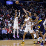
              Cleveland Cavaliers guard Donovan Mitchell (45) shoots a 3-pointer against the New Orleans Pelicans during the second half of an NBA basketball game in New Orleans, Friday, Feb. 10, 2023. (AP Photo/Matthew Hinton)
            