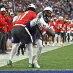 
              NFC return specialist KaVontae Turpin of the Dallas Cowboys is stopped by AFC middle linebacker C.J. Mosley of the New York Jets during the flag football event at the NFL Pro Bowl, Sunday, Feb. 5, 2023, in Las Vegas. (AP Photo/David Becker)
            