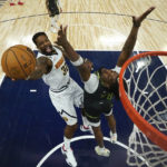 
              Denver Nuggets forward Jeff Green (32) shoots against Minnesota Timberwolves center Naz Reid (11) during the first half of an NBA basketball game, Sunday, Feb. 5, 2023, in Minneapolis. (AP Photo/Abbie Parr)
            