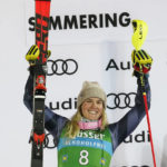 
              FILE - United States' Paula Moltzan celebrates on the podium after taking second place during an alpine ski, World Cup women's slalom in Semmering, Austria, Thursday, Dec. 29, 2022. When Paula Moltzan finished second behind Mikaela Shiffrin for the U.S. ski team’s first 1-2 finish in a women’s World Cup slalom in more than half a century recently, it was easy to assume that her more successful teammate was her main inspiration. (AP Photo/Giovanni Auletta, File)
            