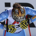 
              A tiger is depicted on the helmet of Italy's Federica Brignone at the finish area of an alpine ski, women's World Championships super G, in Meribel, France, Wednesday, Feb. 8, 2023. (AP Photo/Marco Trovati)
            