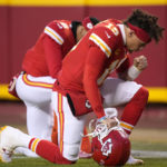 
              FILE - Kansas City Chiefs quarterback Patrick Mahomes prays before the NFL AFC Championship playoff football game against the Cincinnati Bengals, Sunday, Jan. 29, 2023, in Kansas City, Mo. While its Super Bowl commercial appearances are few, religion – Christianity especially – is entrenched in football culture.(AP Photo/Charlie Riedel, File)
            