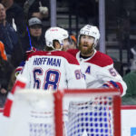 
              Montreal Canadiens' David Savard, right, and Mike Hoffman celebrate after Savard's goal during the first period of an NHL hockey game against the Philadelphia Flyers, Friday, Feb. 24, 2023, in Philadelphia. (AP Photo/Matt Slocum)
            