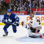 
              Toronto Maple Leafs right wing William Nylander (88) and Chicago Blackhawks goaltender Petr Mrazek (34) watch the puck pass in front of the net during the second period of an NHL hockey game Wednesday, Feb. 15, 2023, in Toronto. (Christopher Katsarov/The Canadian Press via AP)
            