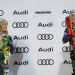 
              FILE - United States' Mikaela Shiffrin, right, winner of an alpine ski, World Cup women's slalom, celebrates on the podium with second placed United States' Paula Moltzan, in Semmering, Austria, Thursday, Dec. 29, 2022. When Paula Moltzan finished second behind Mikaela Shiffrin for the U.S. ski team’s first 1-2 finish in a women’s World Cup slalom in more than half a century recently, it was easy to assume that her more successful teammate was her main inspiration. (AP Photo/Giovanni Auletta, File)
            