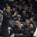 
              Miami Heat head coach Erik Spoelstra signals for a play during the first half of an NBA basketball game against the Charlotte Hornets, Saturday, Feb. 25, 2023, in Charlotte, N.C. (AP Photo/Matt Kelley)
            