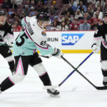 
              Pacific Division's Erik Karlsson, of the San Jose Sharks (65) shoots as Central Division's Josh Morrissey, of the Winnipeg Jets (44) defends during the NHL All Star hockey game, Saturday, Feb. 4, 2023, in Sunrise, Fla. (AP Photo/Lynne Sladky)
            