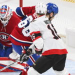 
              Ottawa Senators' Austin Watson (16) scores against Montreal Canadiens goaltender Sam Montembeault as Canadiens' Alex Belzile (60) defends during the third period of an NHL hockey game Saturday, Feb. 25, 2023, in Montreal. (Graham Hughes/The Canadian Press via AP)
            