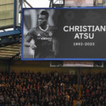 
              Spectators observe a moment of silence for Christian Atsu who died in Turkey earthquake before the English Premier League soccer match between Chelsea and Southampton at the Stamford Bridge stadium in London, Saturday, Feb. 18, 2023. (AP Photo/Kirsty Wigglesworth)
            