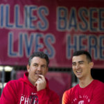 
              Philadelphia Phillies pitcher Noah Song, right, talks with bench coach Mike Calitri at their baseball spring training facility in Clearwater, Fla., Thursday, Feb. 23, 2023.  The Phillies say pitching prospect Noah Song's transfer from active duty to Navy reserves frees him to report to the team. (AP Photo/Chris Carlson)
            