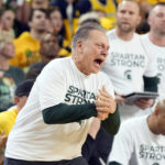 
              Michigan State head coach Tom Izzo yells from the sideline during the second half of an NCAA college basketball game against Michigan, Saturday, Feb. 18, 2023, in Ann Arbor, Mich. (AP Photo/Carlos Osorio)
            