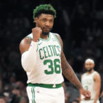 
              Boston Celtics guard Marcus Smart (36) gestures after a point against the Detroit Pistons during the first half of an NBA basketball game, Wednesday, Feb. 15, 2023, in Boston. (AP Photo/Charles Krupa)
            