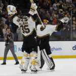 
              FILE - Boston Bruins goaltender Linus Ullmark celebrates with goaltender Jeremy Swayman after an NHL hockey game against the Colorado Avalanche Saturday, Dec. 3, 2022, in Boston. Few expected Ullmark to be the top goaltender in the NHL and backstop the Boston Bruins to the best record in the league. The 29-year-old from Sweden is more comfortable in Boston than he was just after signing there and it's showing on the ice. (AP Photo/Winslow Townson, File)
            