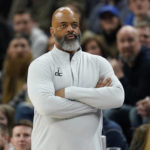 
              Washington Wizards head coach Wes Unseld Jr. watches play during the second half of an NBA basketball game against the Minnesota Timberwolves, Thursday, Feb. 16, 2023, in Minneapolis. (AP Photo/Abbie Parr)
            