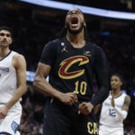 
              Cleveland Cavaliers guard Darius Garland (10) celebrates after scoring against the Memphis Grizzlies during the second half of an NBA basketball game, Thursday, Feb. 2, 2023, in Cleveland. (AP Photo/Ron Schwane)
            