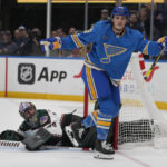 
              St. Louis Blues' Sammy Blais, right, celebrates after scoring past Arizona Coyotes goaltender Karel Vejmelka during the second period of an NHL hockey game Saturday, Feb. 11, 2023, in St. Louis. (AP Photo/Jeff Roberson)
            