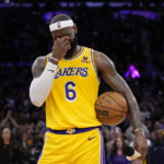 
              Los Angeles Lakers forward LeBron James wipes his eyes after passing Kareem Abdul-Jabbar to become the NBA's all-time leading scorer during the second half of an NBA basketball game against the Oklahoma City Thunder Tuesday, Feb. 7, 2023, in Los Angeles. (AP Photo/Ashley Landis)
            