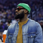 
              Los Angeles Lakers forward LeBron James (6) watches from the bench during the first half of an NBA basketball game against the Golden State Warriors in San Francisco, Saturday, Feb. 11, 2023. (AP Photo/Jed Jacobsohn)
            