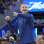
              Golden State Warriors head coach Steve Kerr gestures toward players during the first half of the team's NBA basketball game against the Dallas Mavericks in San Francisco, Saturday, Feb. 4, 2023. (AP Photo/Jeff Chiu)
            