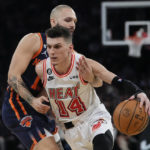 
              Miami Heat's Tyler Herro, right, drives past New York Knicks' Evan Fournier during the first half of an NBA basketball game, Thursday, Feb. 2, 2023, in New York. (AP Photo/Frank Franklin II)
            