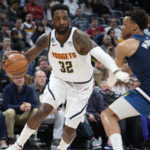 
              Denver Nuggets forward Jeff Green drives past Minnesota Timberwolves guard Wendell Moore Jr. during the second half of an NBA basketball game Tuesday, Feb. 7, 2023, in Denver. (AP Photo/David Zalubowski)
            
