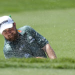 
              Shane Lowry of Ireland hits from a bunker onto the eighth green during the third round of the Honda Classic golf tournament, Saturday, Feb. 25, 2023, in Palm Beach Gardens, Fla. (AP Photo/Lynne Sladky)
            