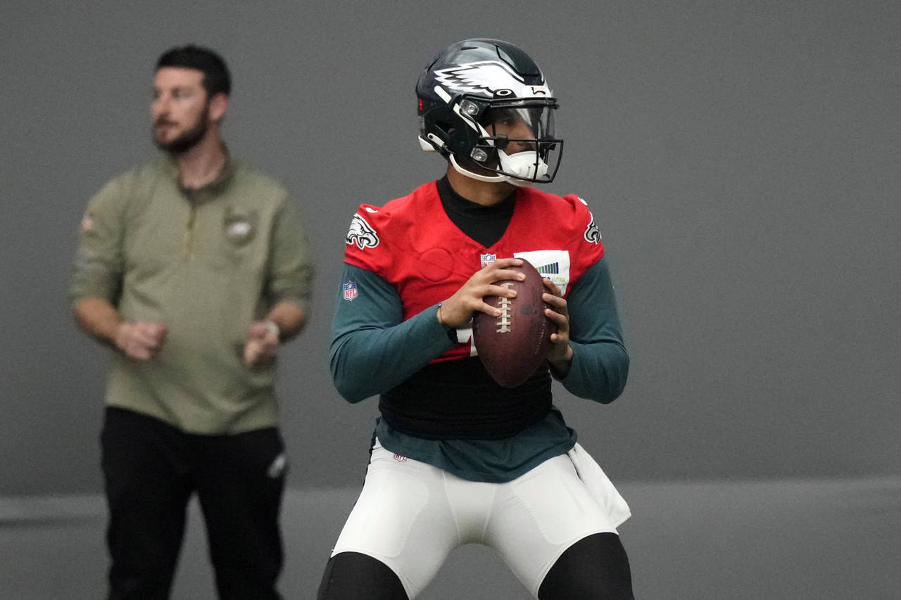 Philadelphia Eagles' Jalen Hurts runs a drill during practice at the NFL football team's training f...