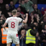
              Southampton's James Ward-Prowse celebrates after scoring his side's opening goal during the English Premier League soccer match between Chelsea and Southampton at the Stamford Bridge stadium in London, Saturday, Feb. 18, 2023. (AP Photo/Kirsty Wigglesworth)
            
