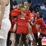 
              St. John's players celebrate their win in an NCAA college basketball game against UConn, Tuesday, Feb. 21, 2023, in Hartford, Conn. (AP Photo/Jessica Hill)
            