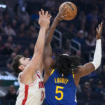 
              Houston Rockets center Alperen Sengun, left, and Golden State Warriors center Kevon Looney compete for possession of the ball during the first half of an NBA basketball game in San Francisco, Friday, Feb. 24, 2023. (AP Photo/Godofredo A. Vásquez)
            