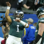 
              Philadelphia Eagles quarterback Jalen Hurts (1) celebrates after scoring a touchdown during the first half of the NFL Super Bowl 57 football game between the Kansas City Chiefs and the Philadelphia Eagles, Sunday, Feb. 12, 2023, in Glendale, Ariz. (AP Photo/Seth Wenig)
            