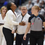 
              UConn head coach Geno Auriemma is held back by assistant coach Jamelle Elliott in the second half of an NCAA college basketball game against South Carolina, Sunday, Feb. 5, 2023, in Hartford, Conn. (AP Photo/Jessica Hill)
            
