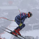 
              United States' Travis Ganong speeds down the course during an alpine ski, men's World Cup downhill race in Kitzbuehel, Austria, Saturday, Jan. 21, 2023. (AP Photo/Marco Trovati)
            