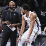 
              Brooklyn Nets head coach Jacque Vaughn, left, talks to guard Spencer Dinwiddie during the second half of an NBA basketball game against the Chicago Bulls, Thursday, Feb. 9, 2023, in New York. (AP Photo/Mary Altaffer)
            
